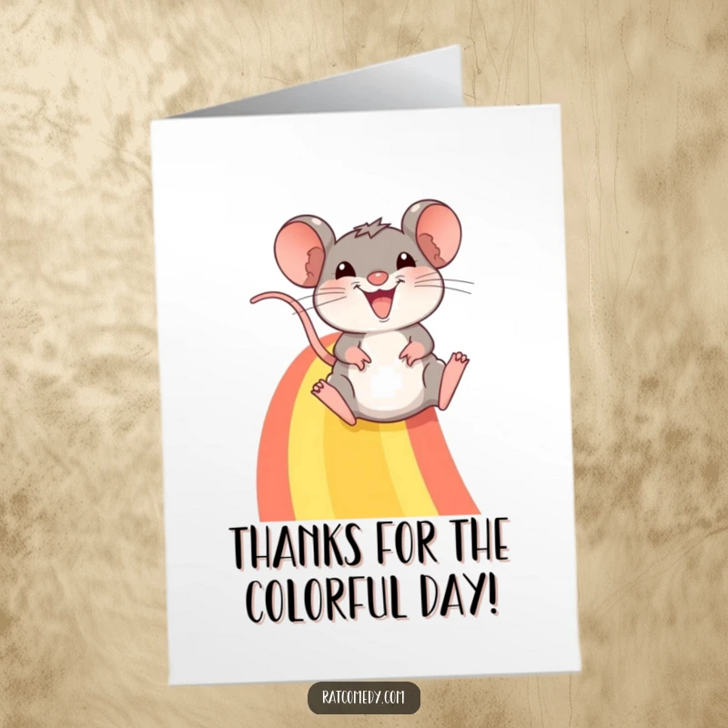 Funny Free Printable Rat sliding down a rainbow with a big smile, expressing thanks, a cheerful downloadable card.