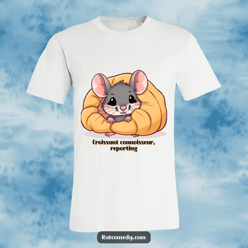 Funny t-shirt: A small rat curiously peeks out from behind a massive, golden-brown croissant, eyeing it with desire.