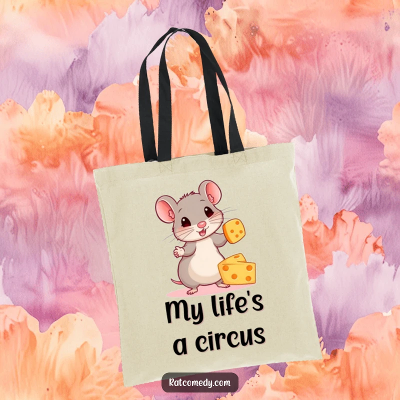 Funny tote bag depicting a small, energetic rat concentrating hard while juggling several round, colorful cheese wheels.